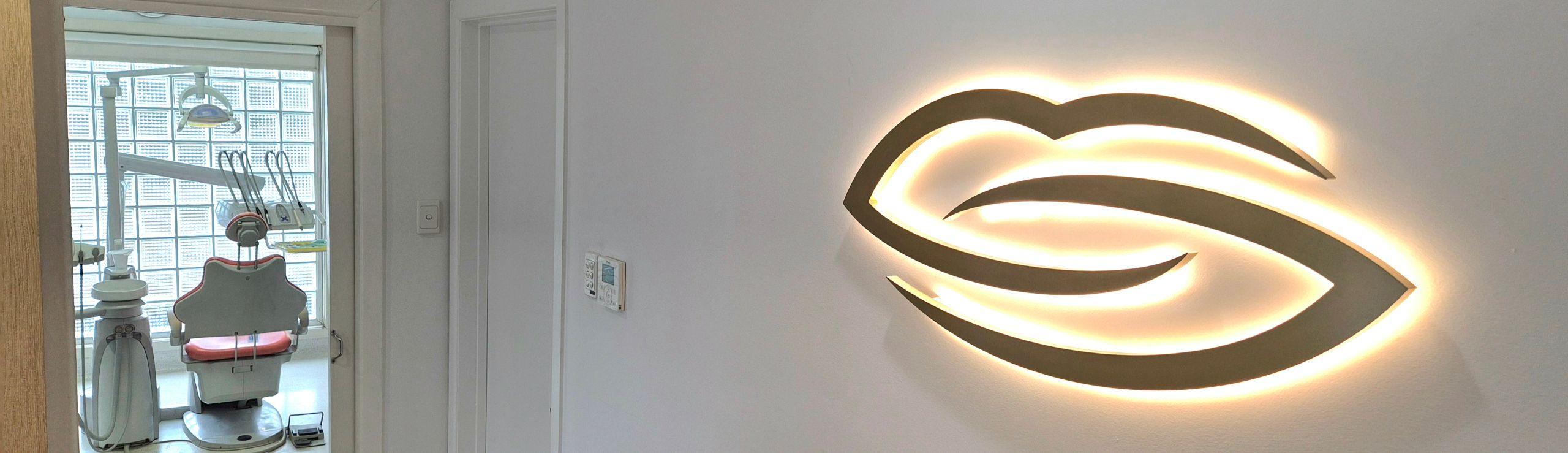 Interior of Brisbane Elite Dental clinic showing reception area and treatment room